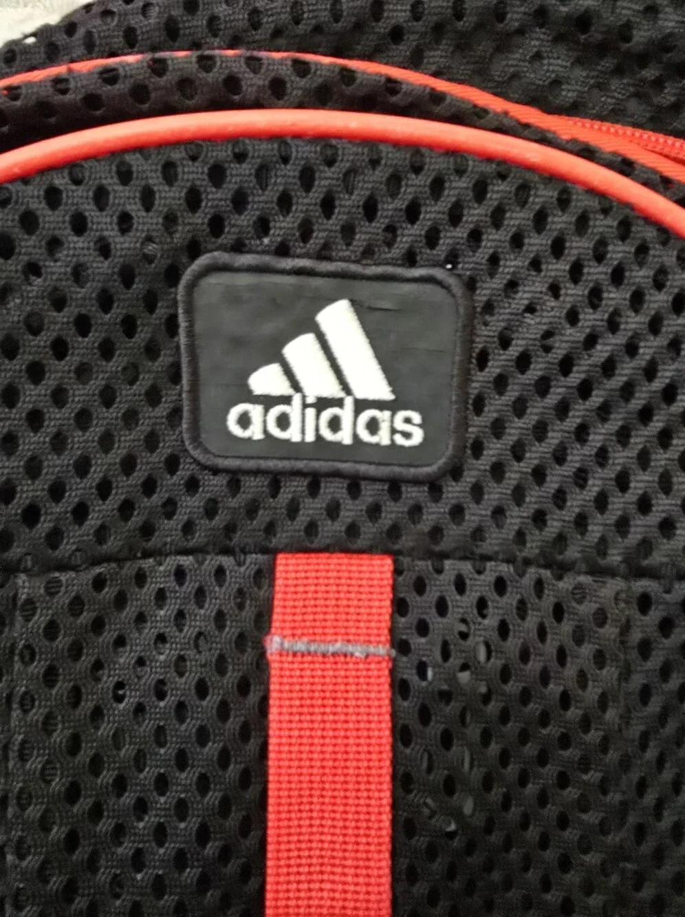 adidas Black Mesh Backpack with Red Trim and Center Strip